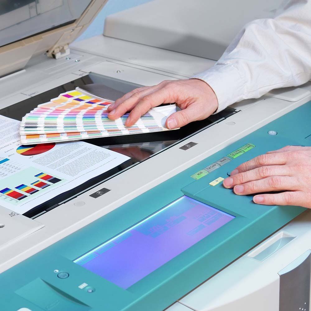 Checking The Printing Color Of Machine — Memphis, TN — American Photocopy Checking The Printing Color Of Machine — Memphis, TN — American Photocopy