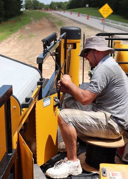 Man Riding on Heavy Equipment