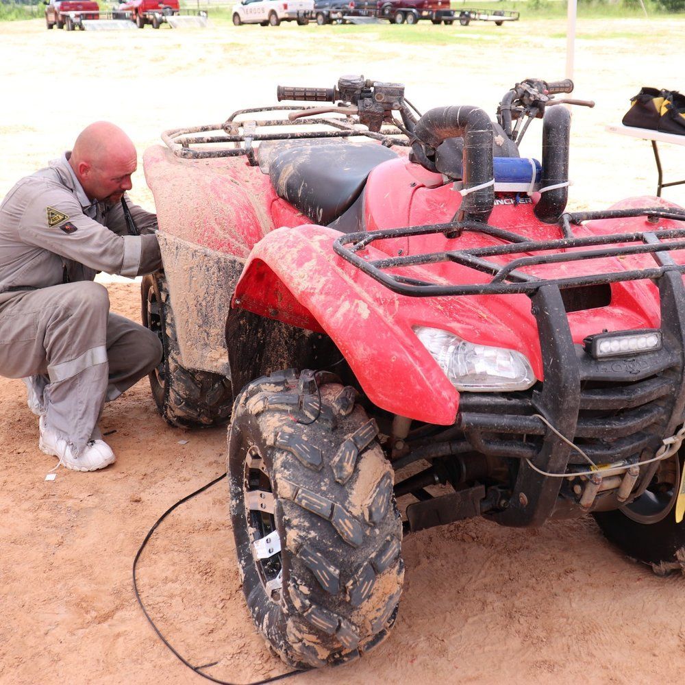 Man Working on ATV