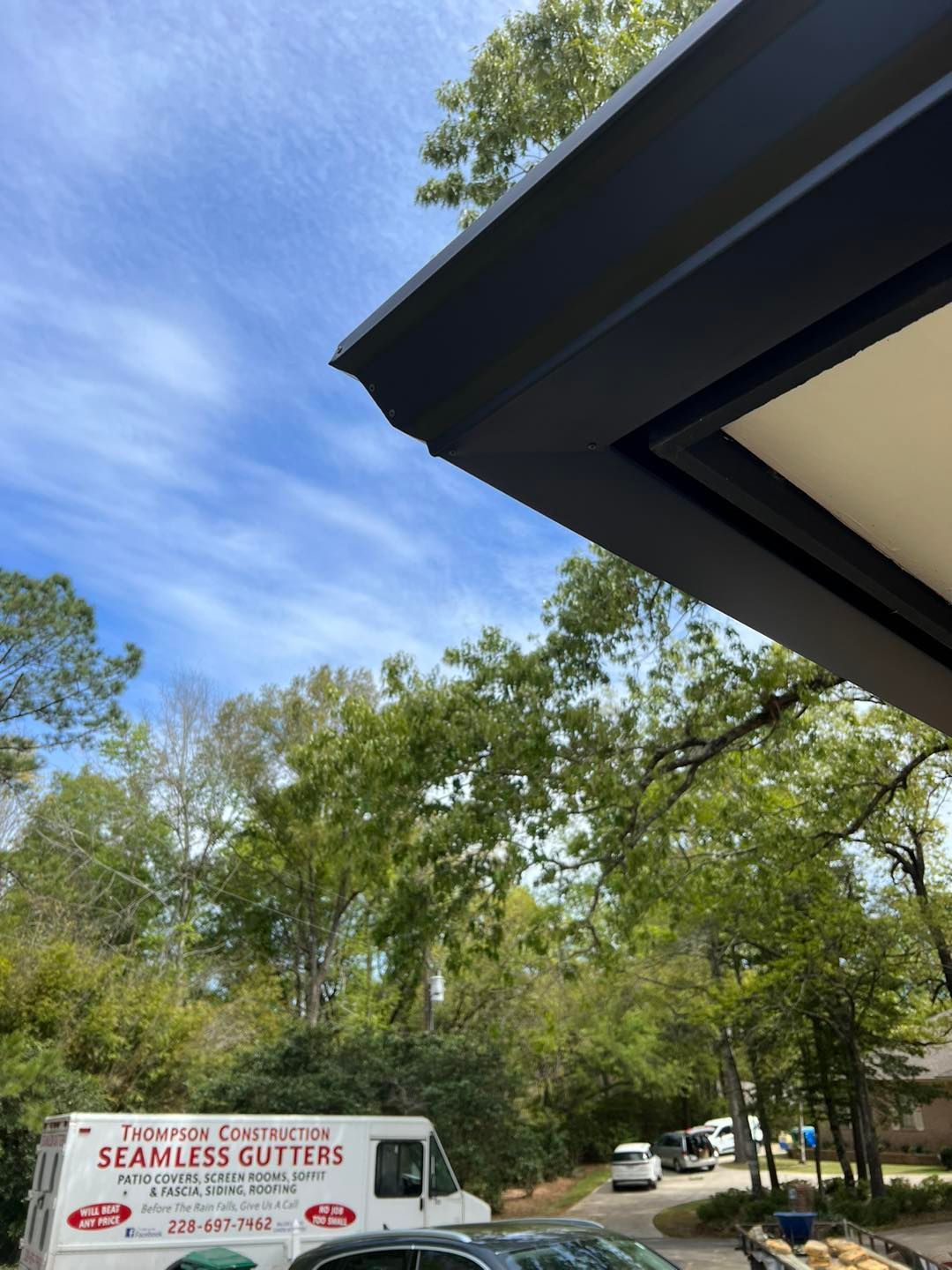 6 inch seamless gutters with Thompson Construction Van