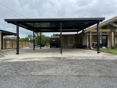 carport/garage turned into another room for the house