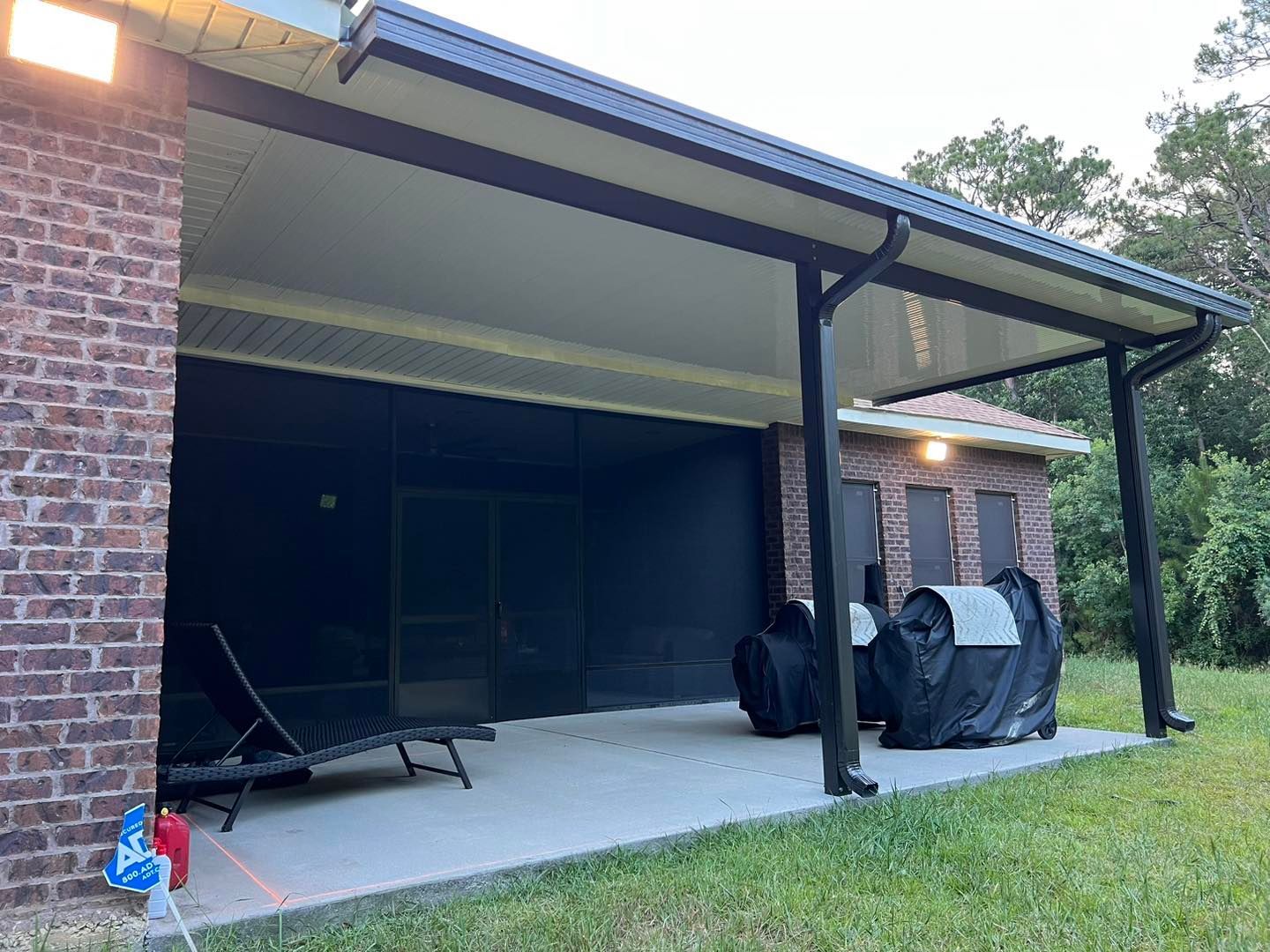 Better Built Patios by Thompson Construction covered patio and an enclosed screened area patio