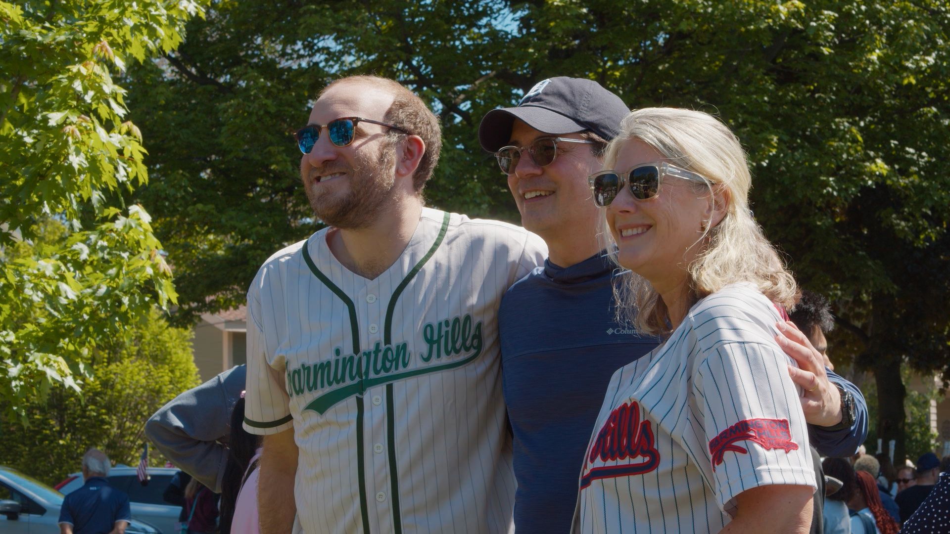 Michael Sawicky in the memorial day parade in Farmington Hills. Three smiling fans