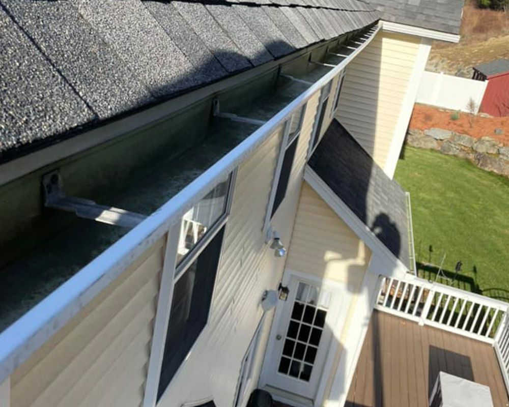 House with Clean Gutter — Worcester, MA — Collazo Home Improvements & Property Maintenance LLC House with Clean Gutter — Worcester, MA — Collazo Home Improvements & Property Maintenance LLC