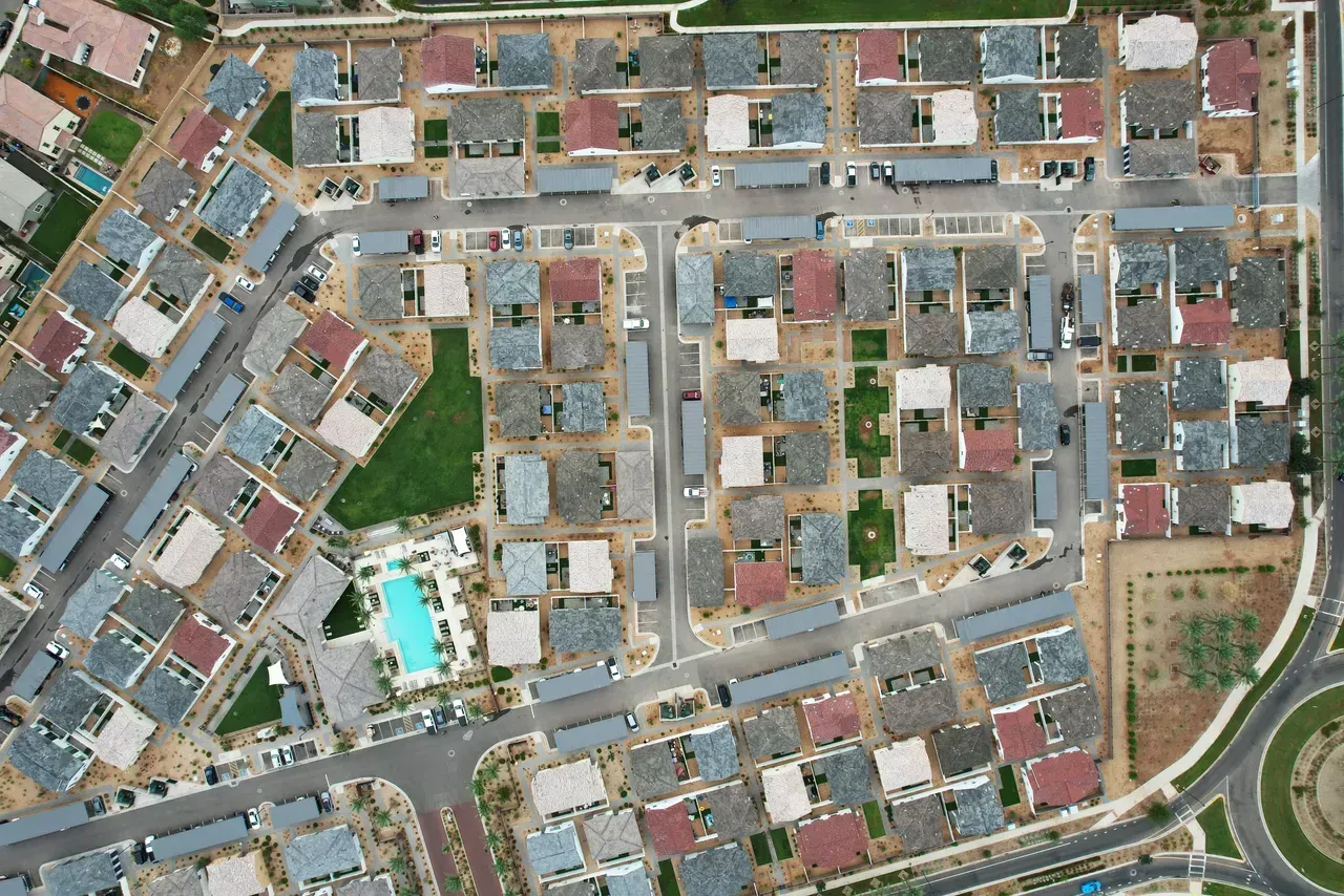 An aerial view of a residential area with lots of houses