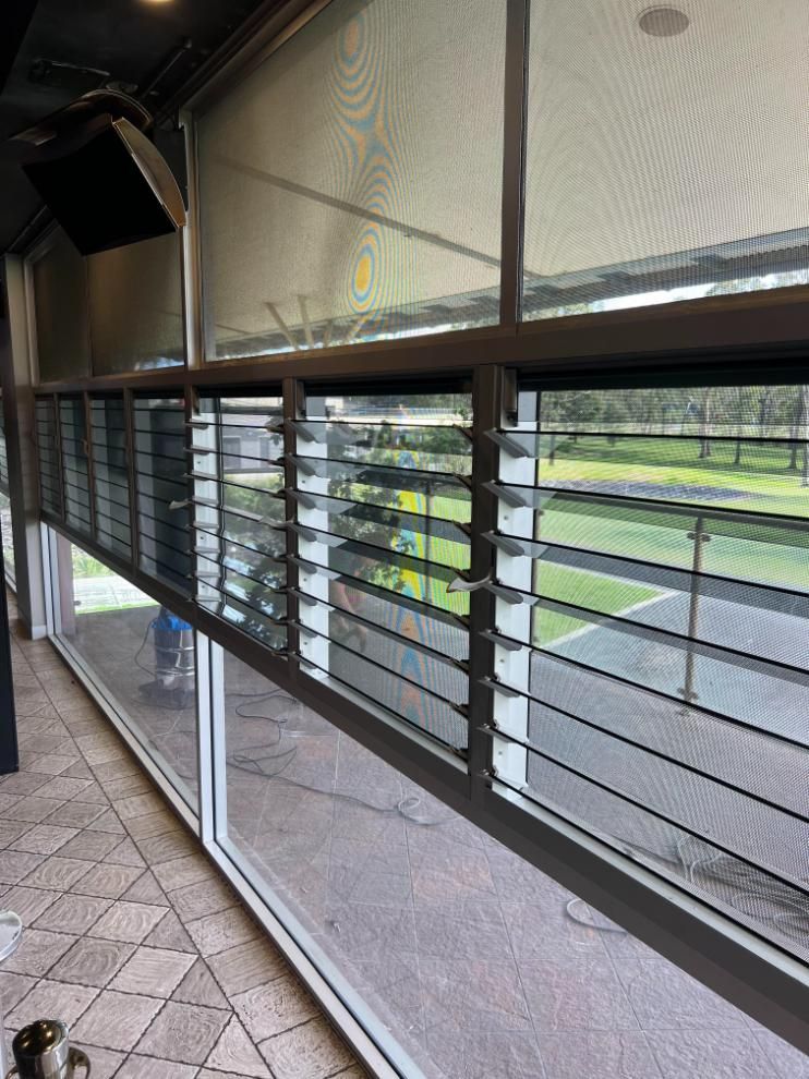 A Large Window With A Lot Of Blinds On It — Glass 24/7 In Taree, NSW