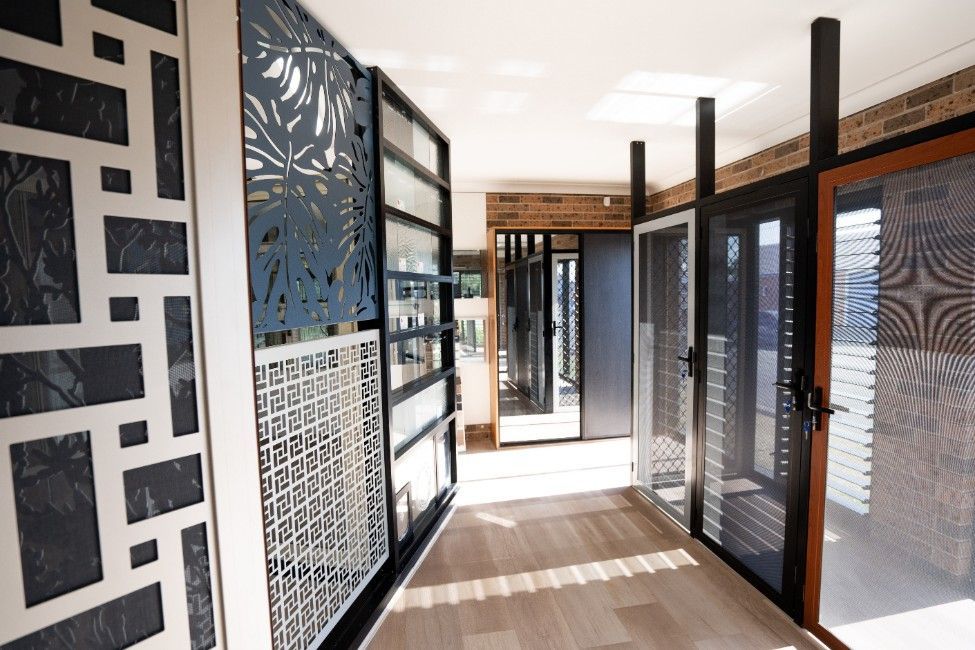 Interior Hallway With Various Decorative Glass Doors — Glass 24/7 In Forster, NSW