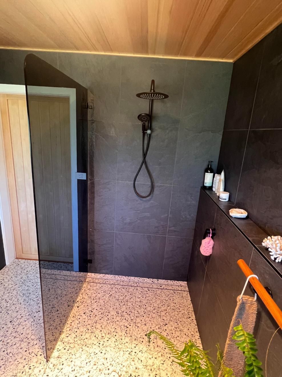 A Bathroom With A Walk In Shower And A Wooden Ceiling — Glass 24/7 In Taree, NSW