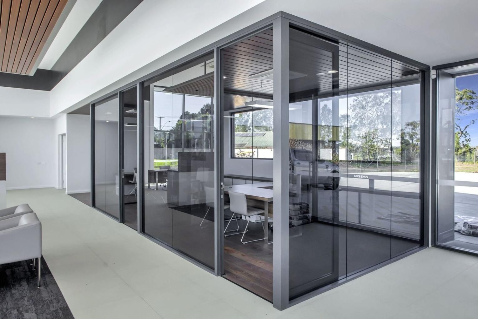 A Room With A Table And Chairs In It And A Lot Of Windows — Glass 24/7 In Tuncurry, NSW
