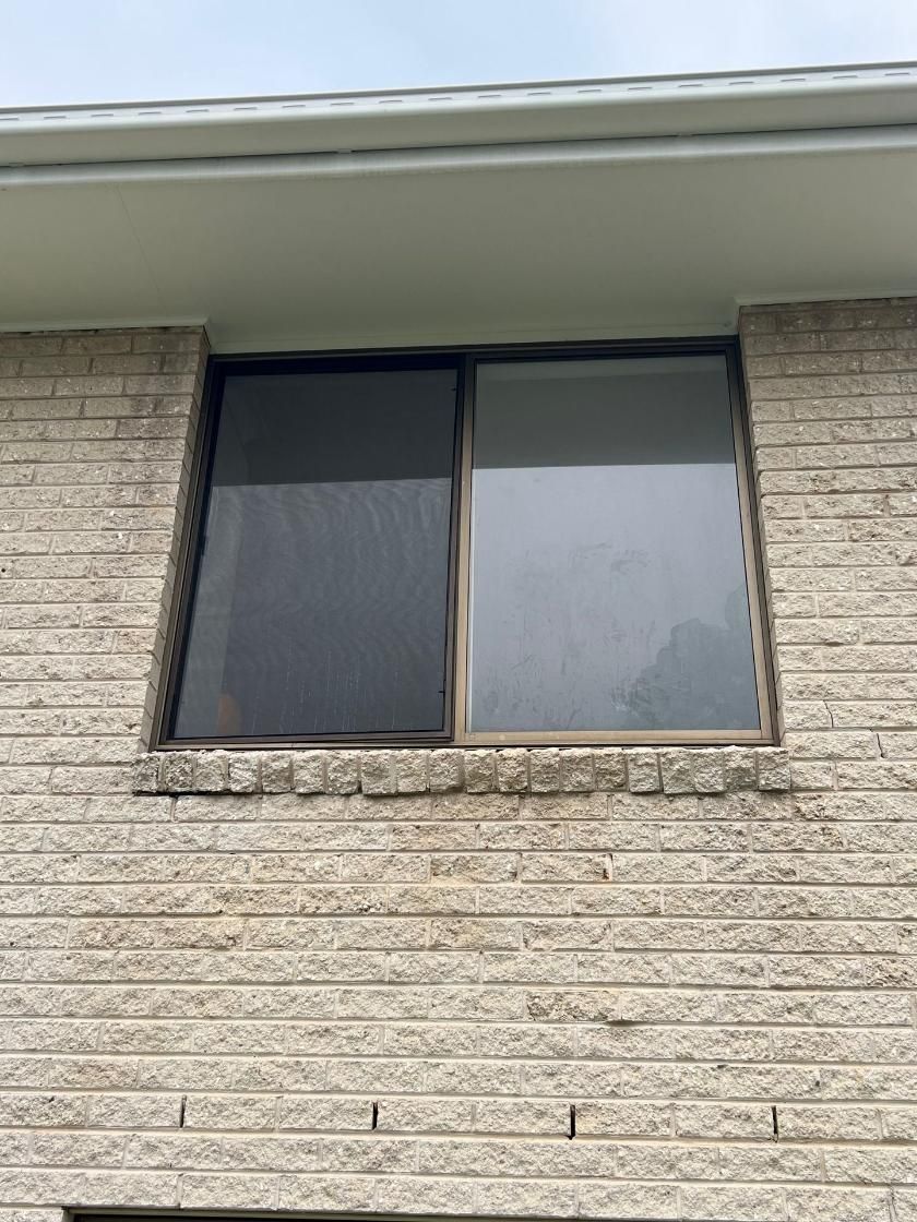 A Brick Building With A Window On The Side Of It — Glass 24/7 In Taree, NSW
