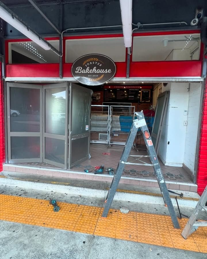 Bakery Shop Under Construction Fixing The Glass Door— Glass 24/7 In Gloucester, NSW