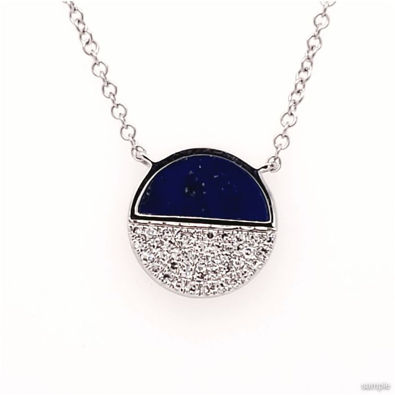 Silver necklace with a half-circle pendant. The top half is blue, and the bottom half is covered in small white stones.