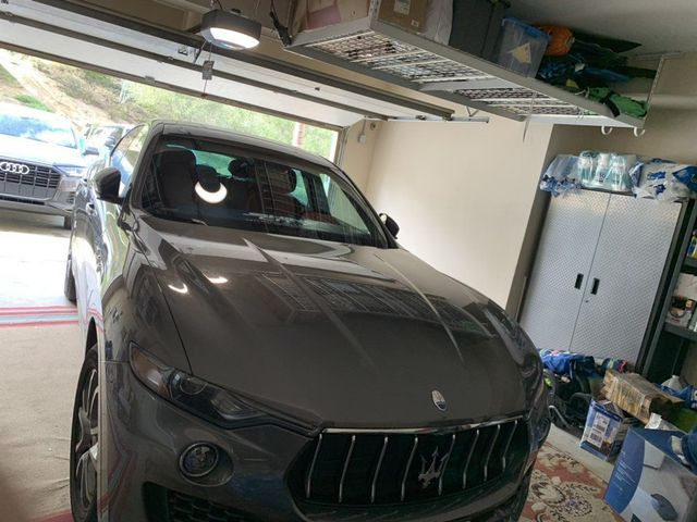 Gray Maserati windshield replacement