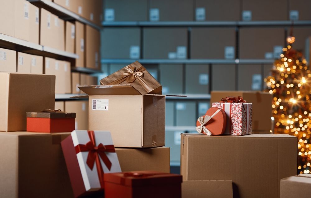 Christmas/holiday decorations in storage bins.