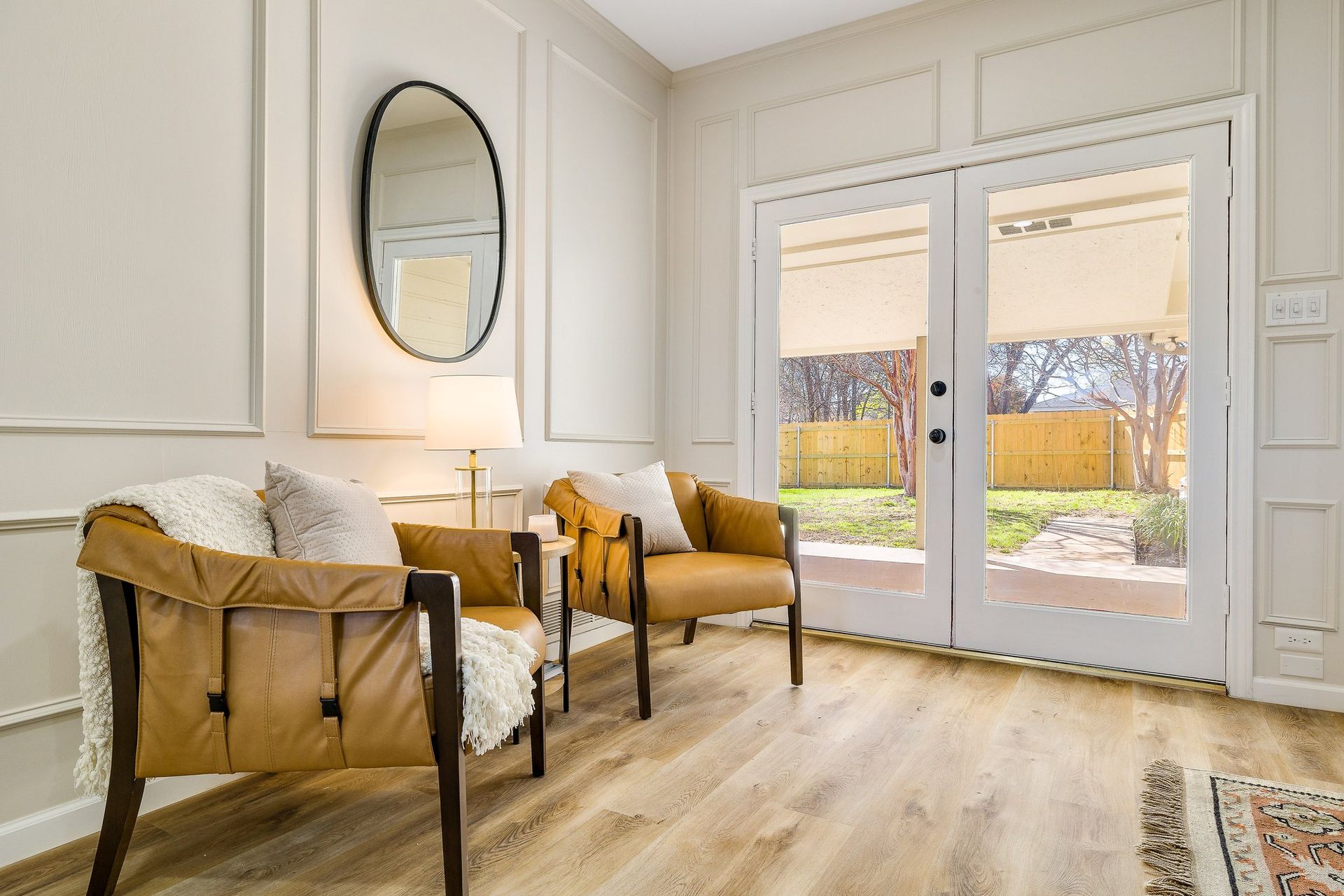 Custom wainscoting and interior painting with luxury vinyl floor installation after a water mitigation fire reconstruction project completed during an insurance claim with custom exterior doors in Richardson Canyon Creek Texas