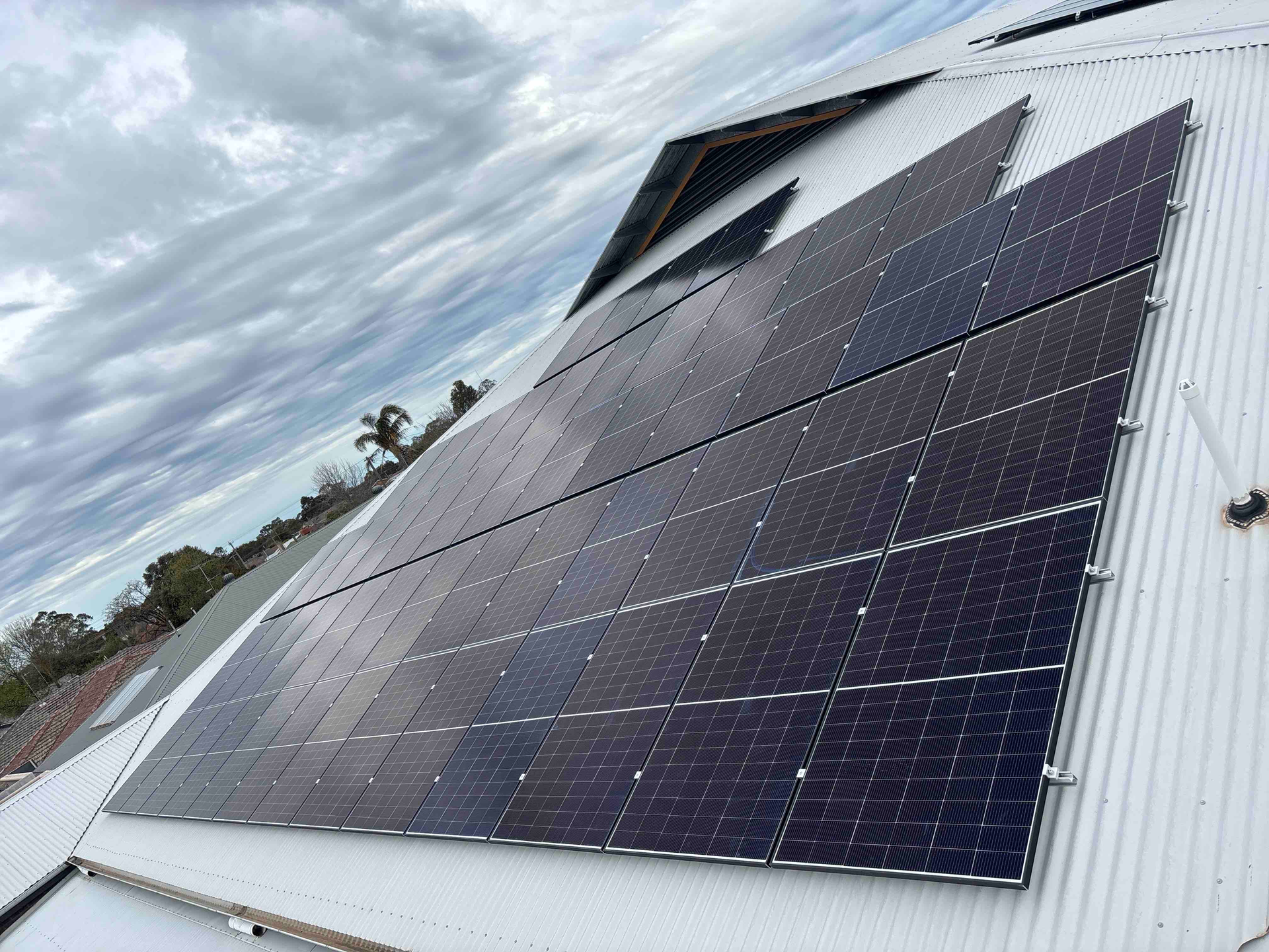 part of a 99kw solar installation on a steep metal roof in Horsham VIC