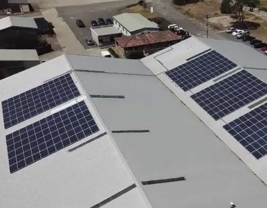 commercial solar panels installed on laminex building australia