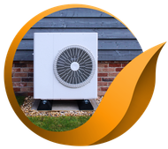 White heat pump against a brick and wooden exterior, set in gravel with a stylized orange leaf.