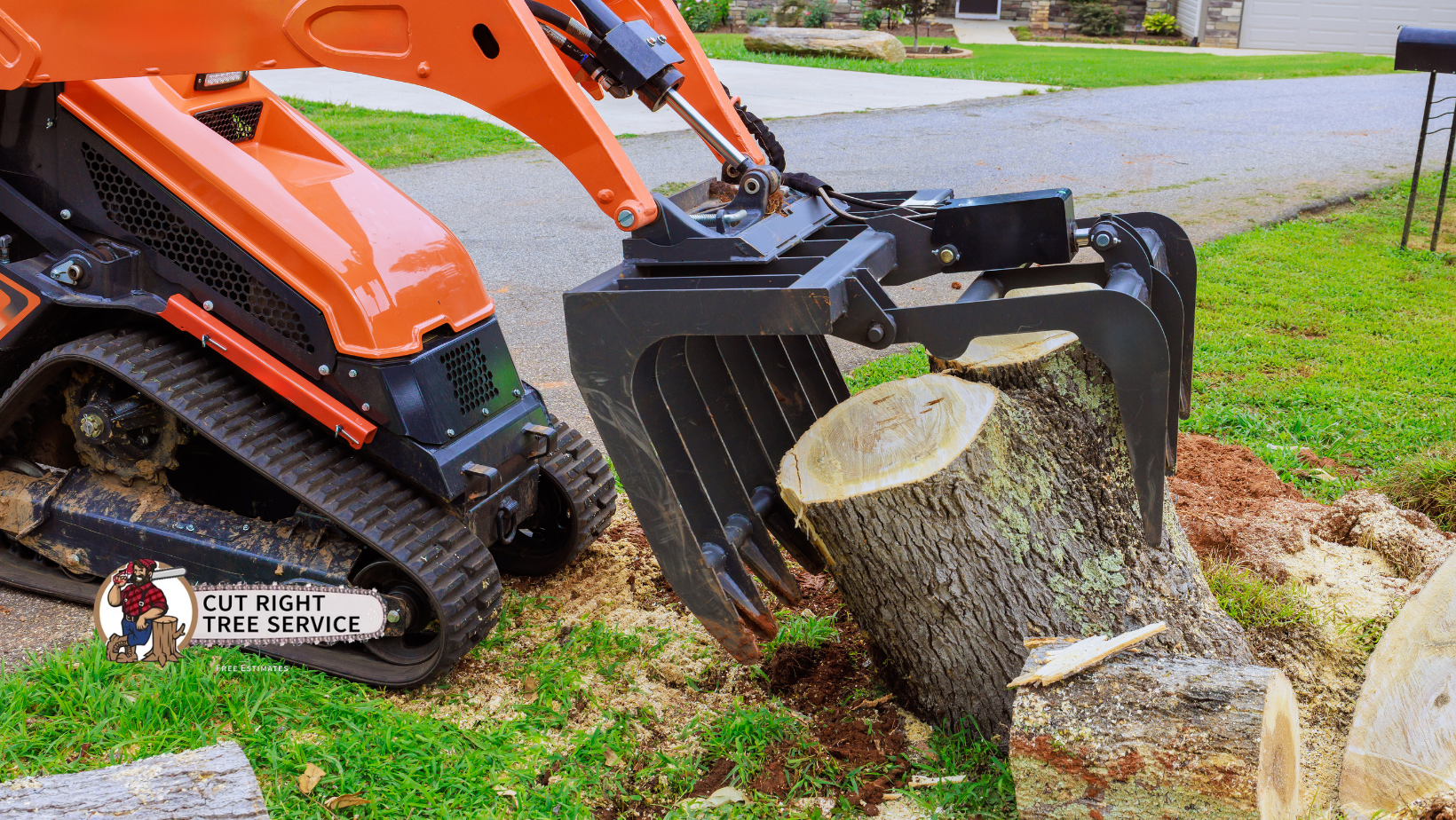 Orange mini excavator with grapple lifting a tree trunk.