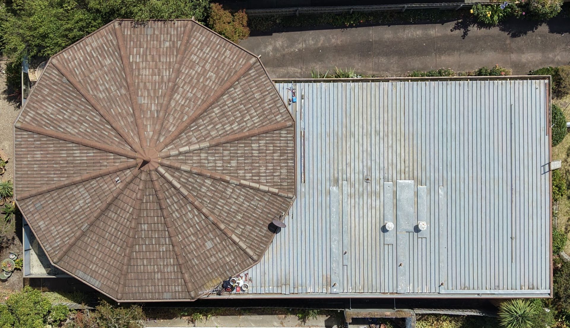 Aerial View of a Building With a Round Brown Roof — Hinch Plumbing In Breakwater, VIC
