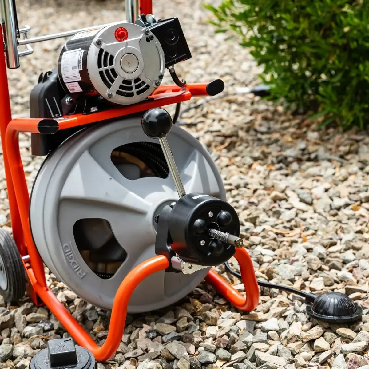 RIDGID drum drain cleaning machine set up at a cleanout for drain cleaning in Gilbert