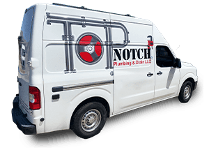 A white van with the word top notch plumbing & drain LLC on the side is on a white background.