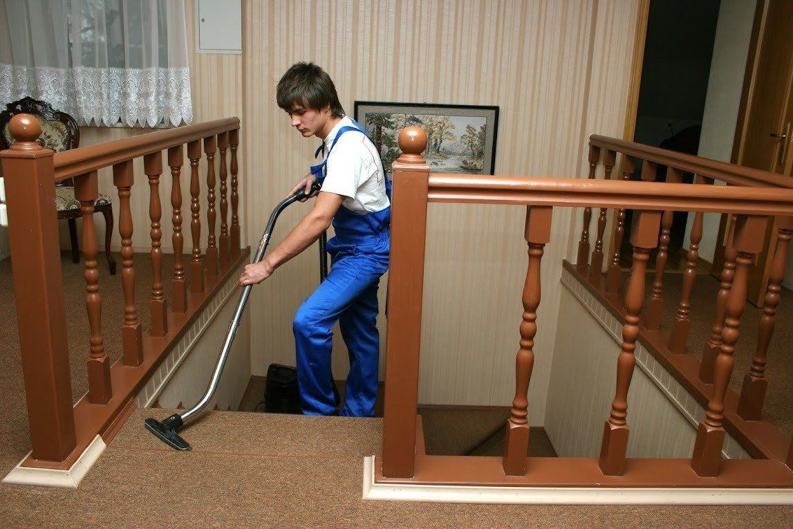 Man Cleaning on Stairs — Queen Creek, AZ — All State Carpet & Tile Care Man Cleaning on Stairs — Queen Creek, AZ — All State Carpet & Tile Care