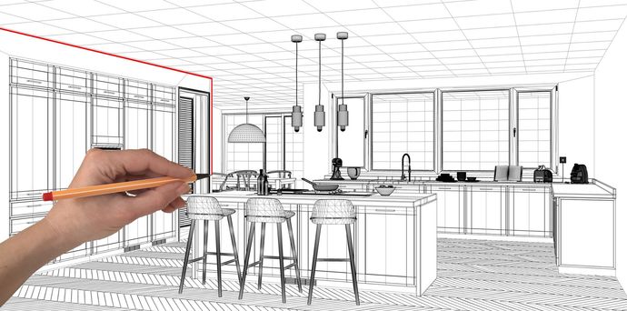 Una mano che tiene una matita sopra uno schizzo di un progetto di interni per una cucina moderna.