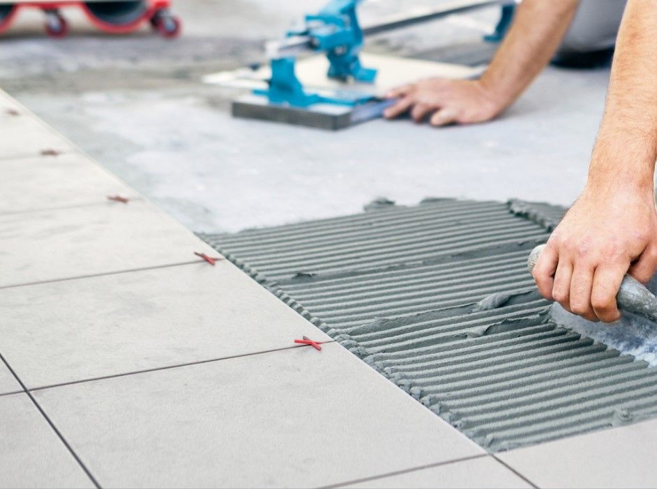 Installing ceramic floor tiles in Derby