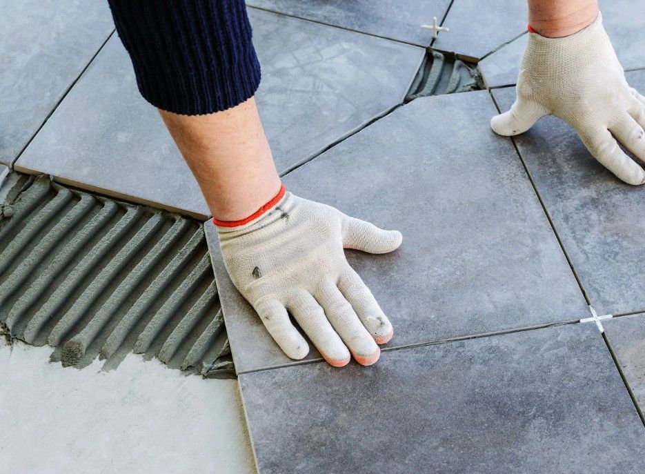 Derbyshire Tiling Specialists fitting ceramic kitchen floor tiles in Derby 