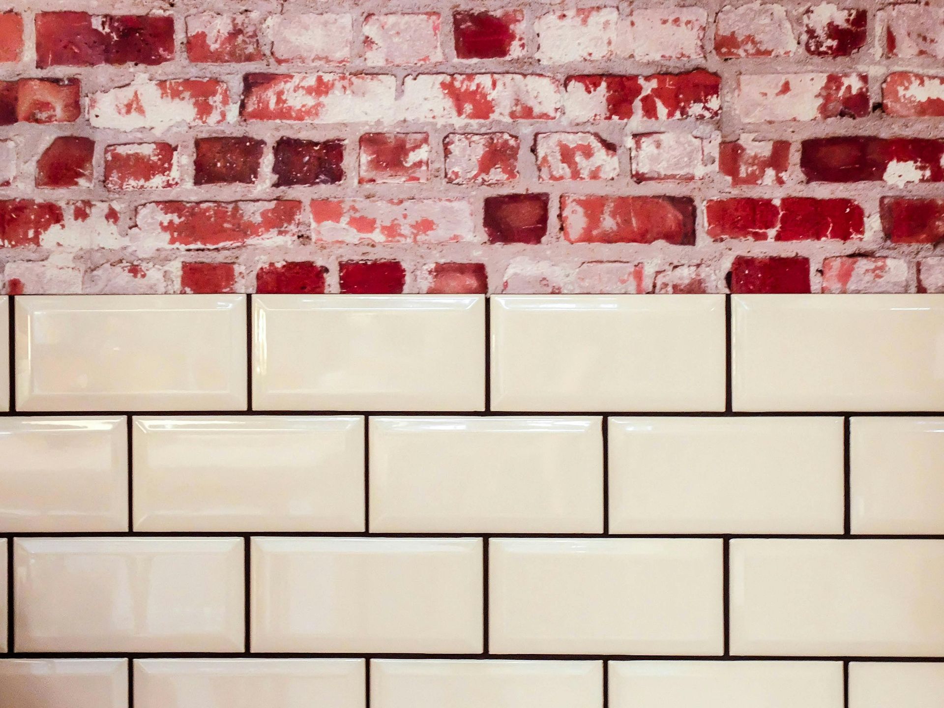 Tiling over an old brick wall