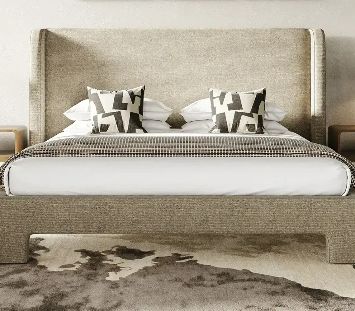A modern, low-profile bed frame with a walnut wood headboard and base, featuring dark wooden slats on a white background.
