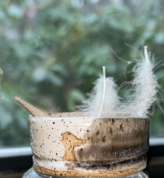 Custom made bowl with feathers inside it