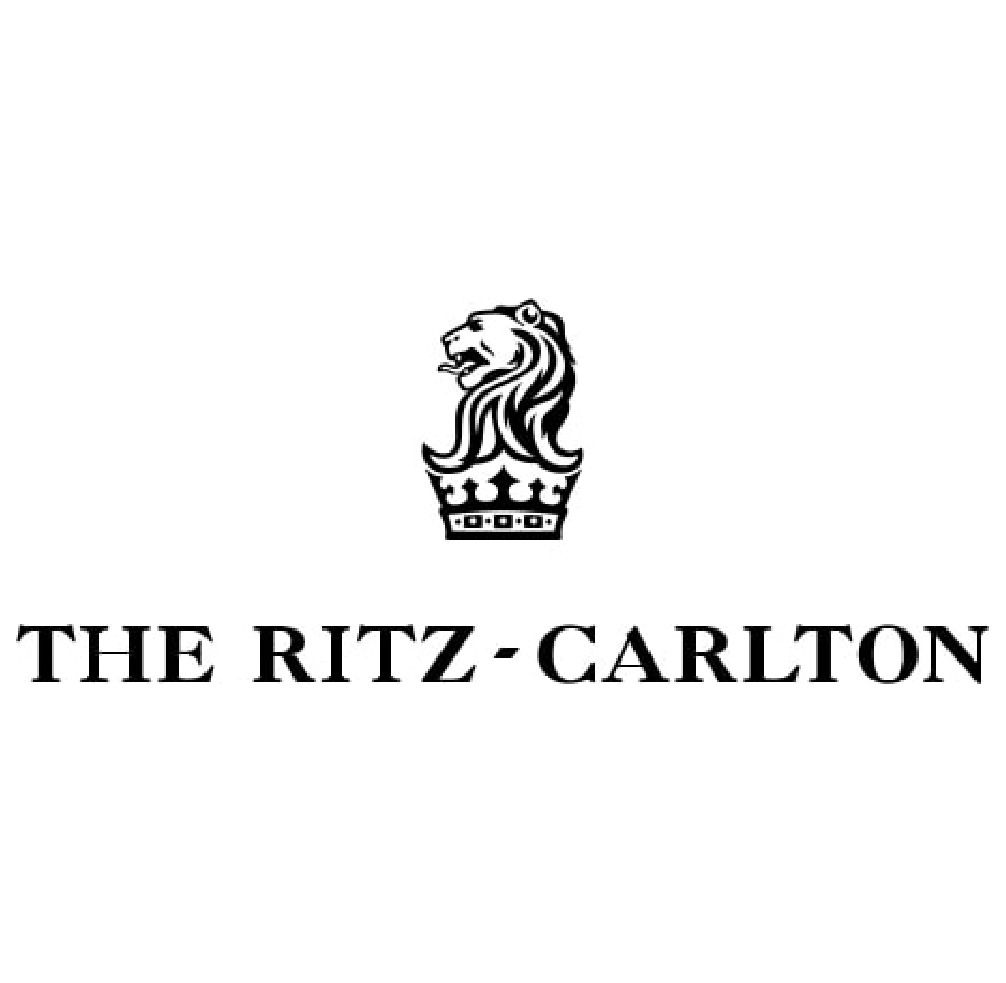 The ritz carlton logo is a black and white logo with a lion and a crown.