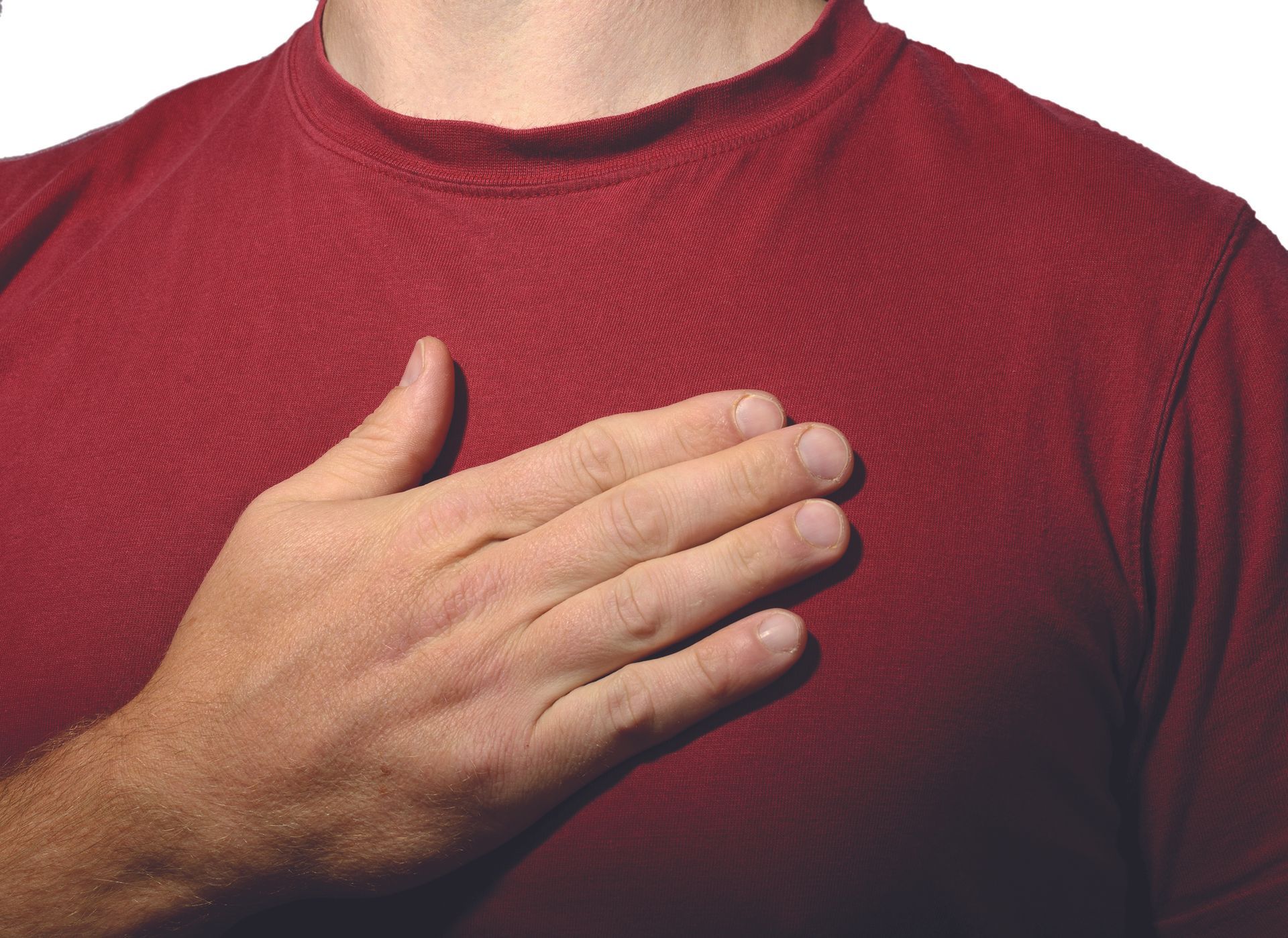 Hand over heart on red shirt, as if making a pledge