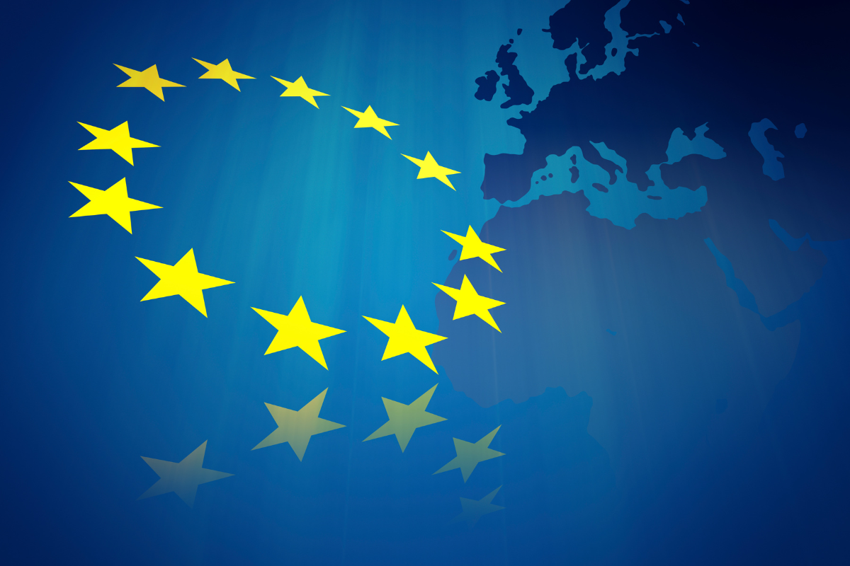 A blue background with yellow stars and a map of europe