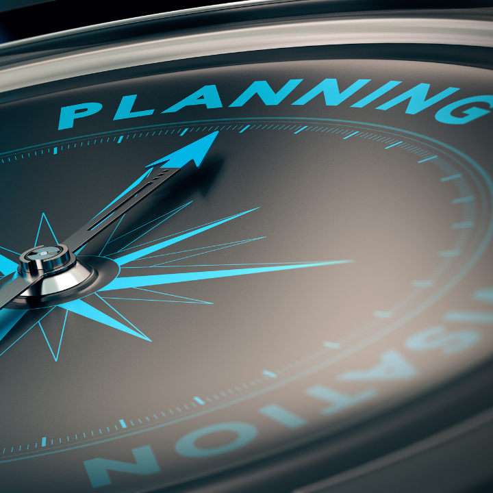 A clock with the word planning on it