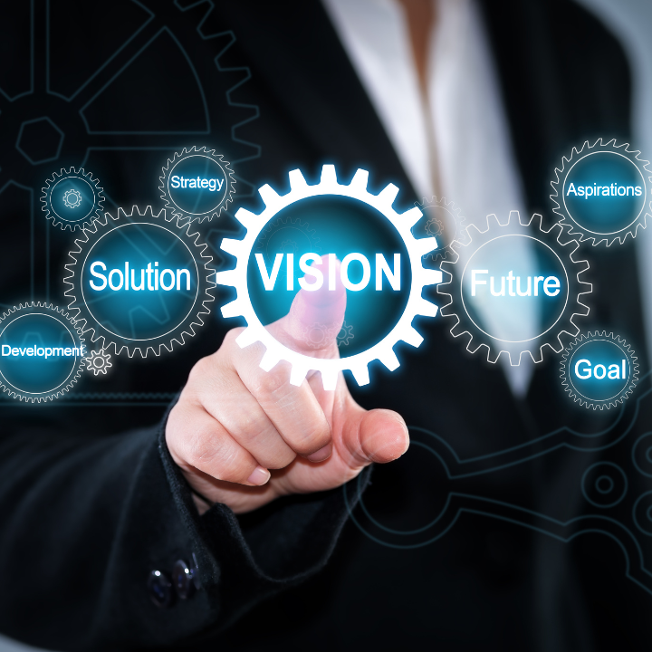 A person is pressing a button that says vision