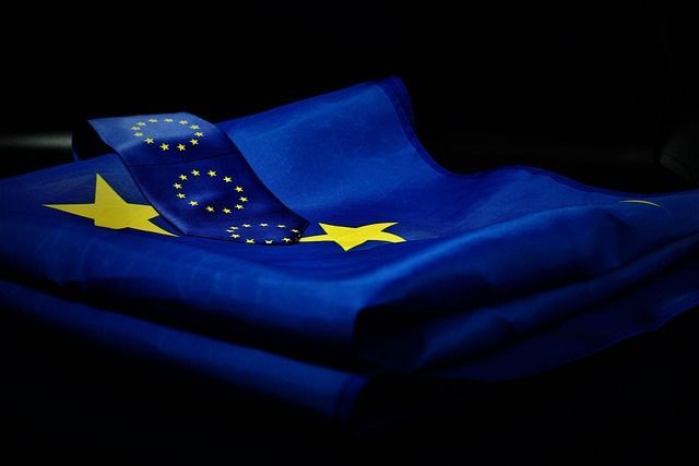 A blue flag with yellow stars on it
