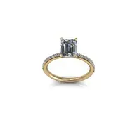 Gold ring with a square-cut diamond solitaire on a white background