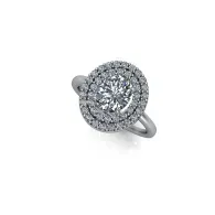 Silver ring with a large round diamond halo setting on a white background