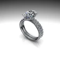 Diamond engagement ring with a round center stone and pavé band on a white background
