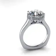 Silver diamond solitaire ring on a white background