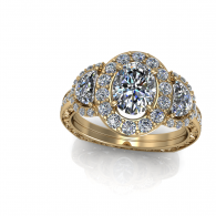 Gold diamond halo engagement ring on a white background
