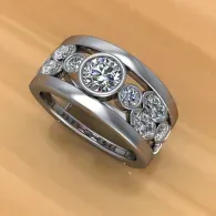 Silver ring with round diamond cluster design on a light wooden surface