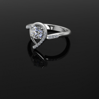 Silver ring with a round gemstone and a curved, diamond-accented band on a black background
