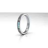 Silver ring with small blue stones along one side, isolated on a white background