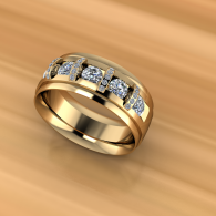 Gold ring with square diamond stones on a warm blurred background