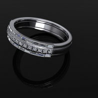 Silver diamond-studded ring on a black background