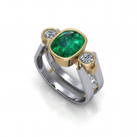 Silver and gold ring with a large oval green gemstone and two small clear stones